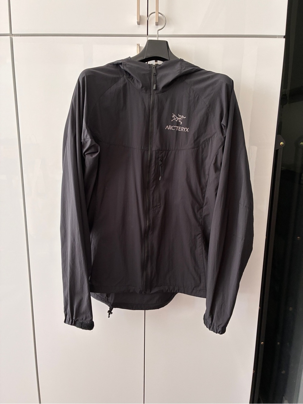 Arc'teryx Black Hooded Windbreaker Jacket with Chest Logo
